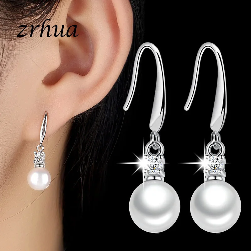 ZRHUA 925 Sterling Silver Clear Pearl Earrings Simple Round White Crystal Jewelry Classic Dangle Earrings For Women Elegant Gift
ZRHUA 925 Sterling Silver Clear Pearl Earrings Simple Round White Crystal Jewelry Classic Dangle Earrings For Women Elegant Gift