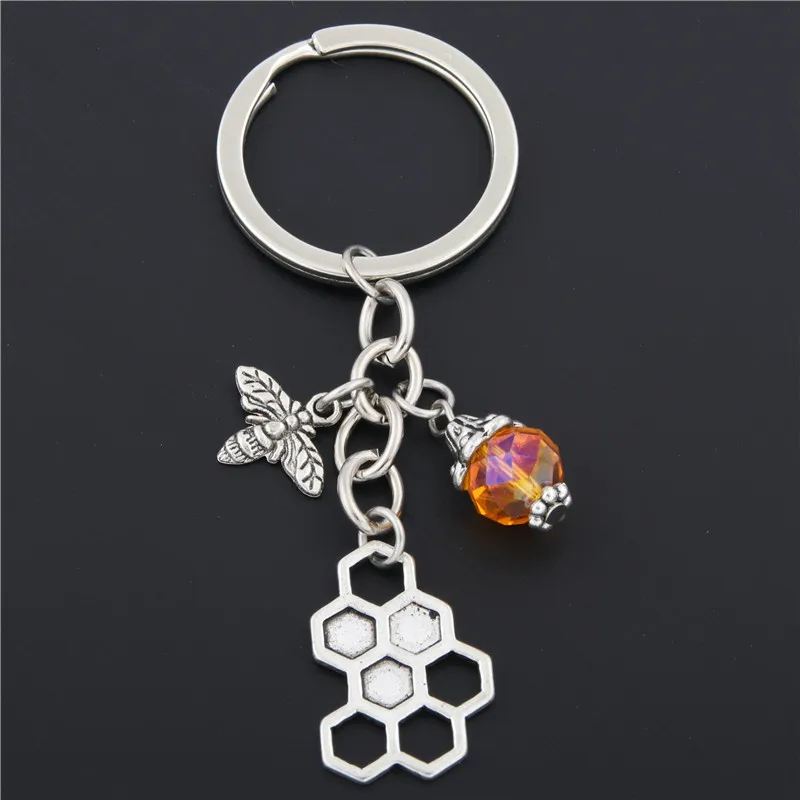 1pc Bumble Bee Keychain Honeycomb With Bead Keyring Gift For Bee Keeper Honey Bee Jewelry Gift For Her Insect Charms E1671
1pc Bumble Bee Keychain Honeycomb With Bead Keyring Gift For Bee Keeper Honey Bee Jewelry Gift For Her Insect Charms E1671