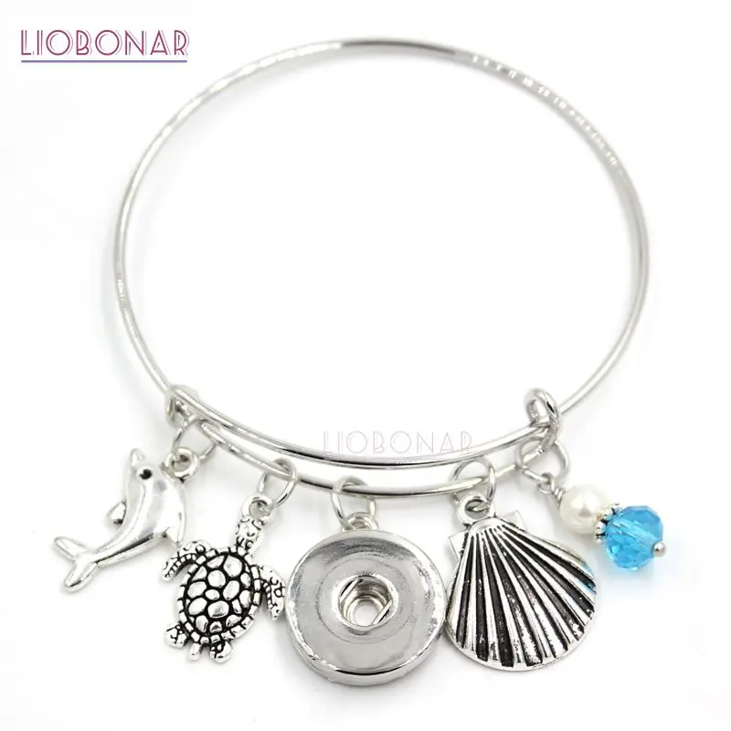 1PC 18mm Snap Jewelry Ocean Bracelet Seashell Turtle Dolphin Charm Bracelets Expandable Bangle Snap Bracelets Women Gifts
1PC 18mm Snap Jewelry Ocean Bracelet Seashell Turtle Dolphin Charm Bracelets Expandable Bangle Snap Bracelets Women Gifts