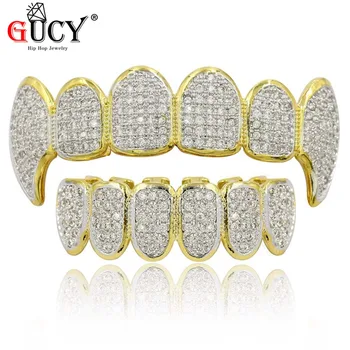 GUCY Hip Hop Gold Teeth Grills Micro Pave CZ Grills Tooth Top&Bottom Vampire Fang Iced Out Grills Dental Mouth Jewelry
GUCY Hip Hop Gold Teeth Grills Micro Pave CZ Grills Tooth Top&Bottom Vampire Fang Iced Out Grills Dental Mouth Jewelry