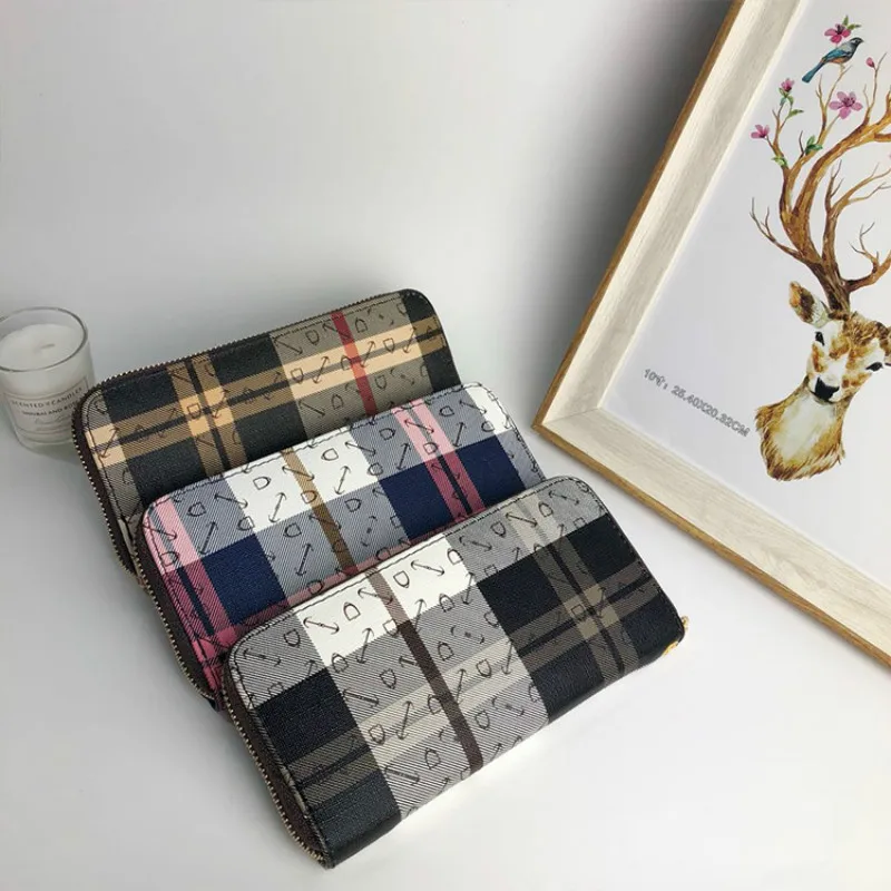 2019 latest women's hot sale fashion personality plaid long section hand trend change multi-card card wild wallet
2019 latest women's hot sale fashion personality plaid long section hand trend change multi-card card wild wallet