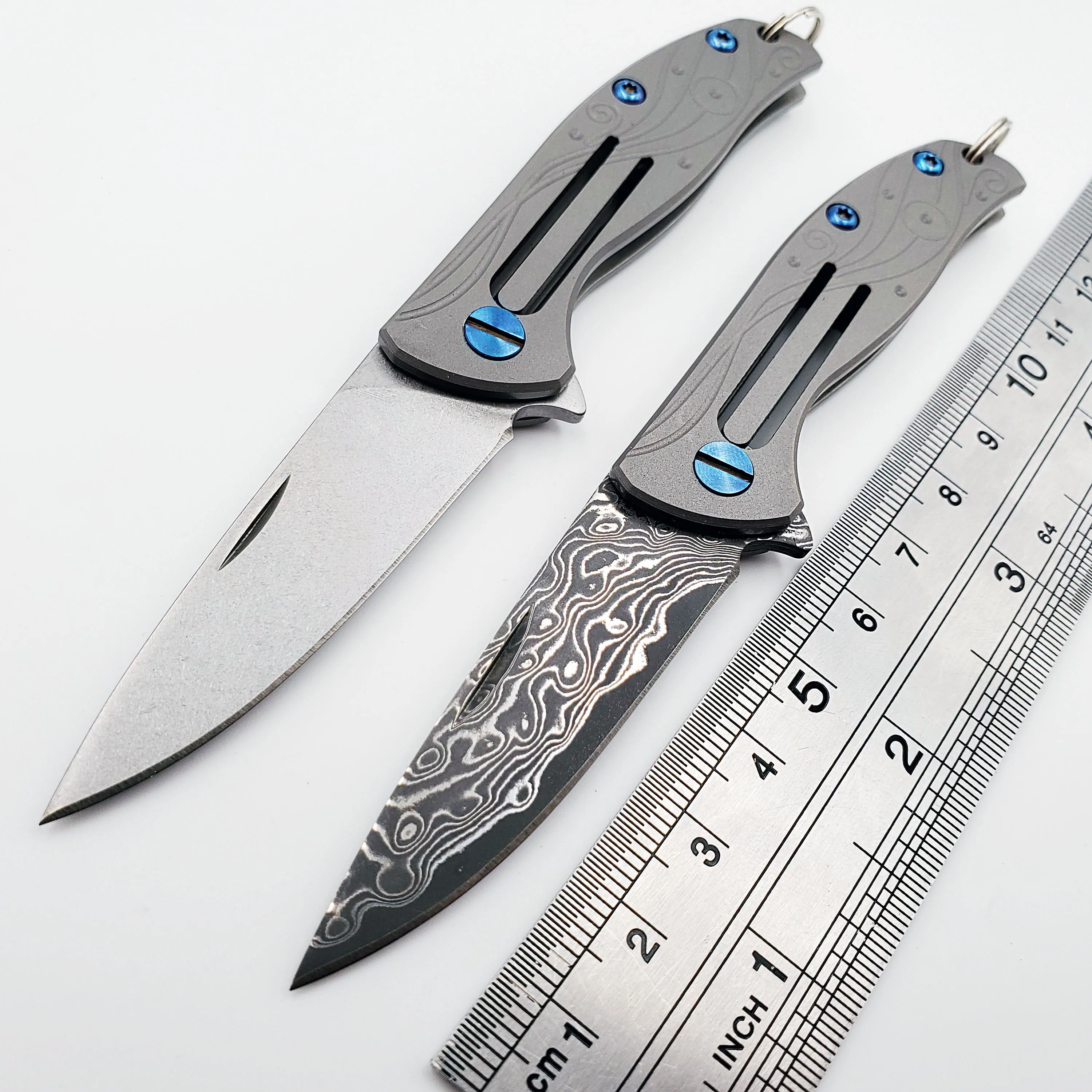 JSSQ Mini Folding Knife Damascus D2 Blade Titanium Handle Camping Outdoor Pocket Knives Key pendant Survival Hunting EDC Tools
JSSQ Mini Folding Knife Damascus D2 Blade Titanium Handle Camping Outdoor Pocket Knives Key pendant Survival Hunting EDC Tools