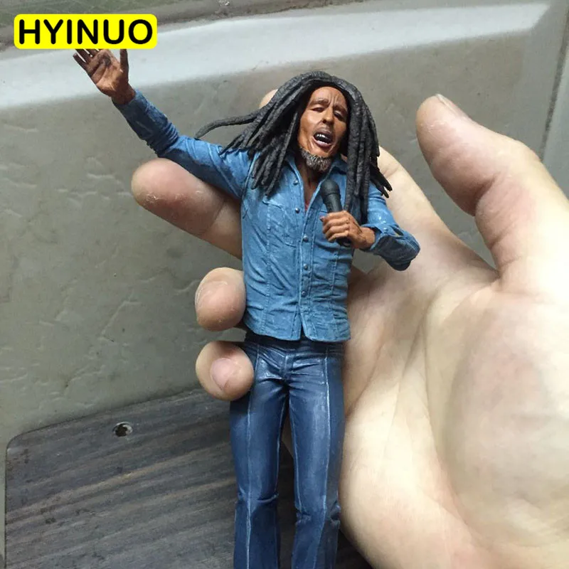 18cm Scale The Originator of Reggae Music Musician Bob Marley Hand Model Doll PVC Action Figures Doll
18cm Scale The Originator of Reggae Music Musician Bob Marley Hand Model Doll PVC Action Figures Doll