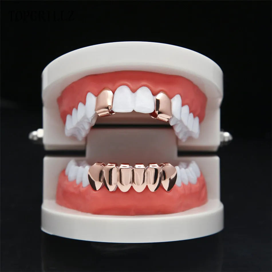 TOPGRILLZ New Custom Fit Hip Hop Rose Gold Color Plated Mouth Grillz Set 2 pcs Single Top & 6 teeth Bottom Set Black Gun Grills
TOPGRILLZ New Custom Fit Hip Hop Rose Gold Color Plated Mouth Grillz Set 2 pcs Single Top & 6 teeth Bottom Set Black Gun Grills