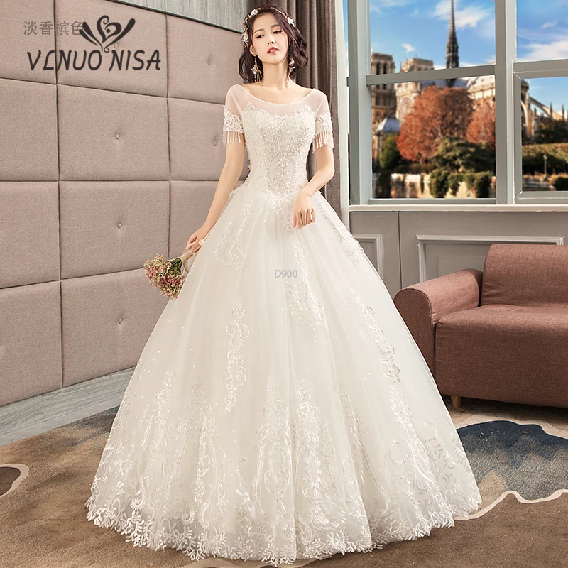 Ball Gown Wedding Dresses 2019 sexy Lace o-neck Illusion Appliques Pearls Bridal Gowns Tassel Cut-out Vestido De Novias
Ball Gown Wedding Dresses 2019 sexy Lace o-neck Illusion Appliques Pearls Bridal Gowns Tassel Cut-out Vestido De Novias