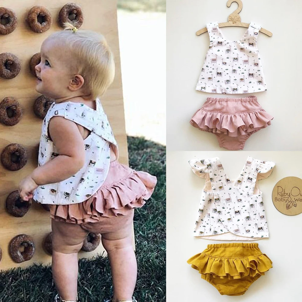 Newborn Baby Girl Clothes 2pcs Alapca Print Vest Top Solid Color Ruffle Shorts Outfits Sunsuit Set
Newborn Baby Girl Clothes 2pcs Alapca Print Vest Top Solid Color Ruffle Shorts Outfits Sunsuit Set