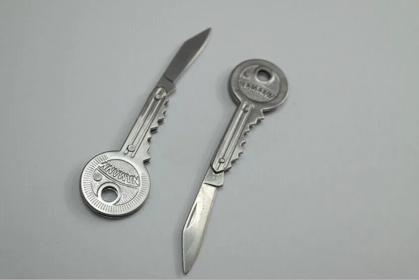 Protable Key Fold Knife Creative gift cutting tool Key Pocket Knife Key Chain Knife Peeler Mini Camping Key Ring Knife Tool
Protable Key Fold Knife Creative gift cutting tool Key Pocket Knife Key Chain Knife Peeler Mini Camping Key Ring Knife Tool