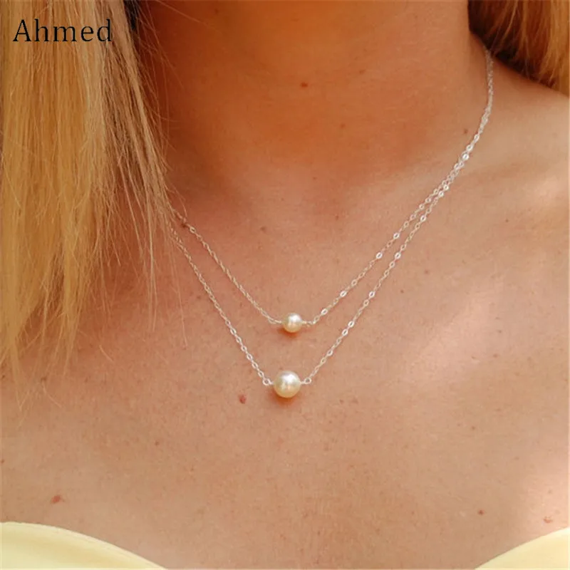 Ahmed Simple Gold/Silver Color Imitation Pearls Accessory Pendant Necklace For Women Fashion Jewelry Double Chain Collier Femme
Ahmed Simple Gold/Silver Color Imitation Pearls Accessory Pendant Necklace For Women Fashion Jewelry Double Chain Collier Femme