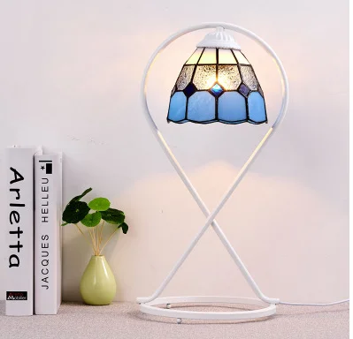 European bedroom bedside lamp retro adjustable modern simple American art eye protector lamp
European bedroom bedside lamp retro adjustable modern simple American art eye protector lamp