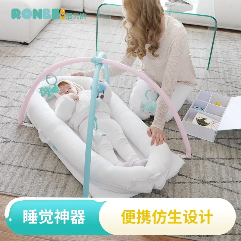 

Ergonomics design portable crib multi-functional newborn bed with a simple mattress bionic design baby bed Co-Sleeping Cribs