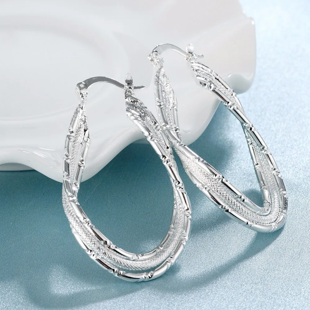 Trendy Silver Color Large Flat Geometric Creole Hoop Earring Romantic Twist Thick Loop Earring Women Jewelry Anting Wanita Bijou
Trendy Silver Color Large Flat Geometric Creole Hoop Earring Romantic Twist Thick Loop Earring Women Jewelry Anting Wanita Bijou