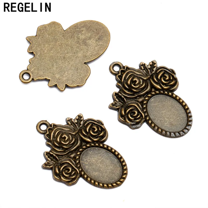 REGELIN wholesale oval rose Antique Bronze Pendant Trays 14*10 mm 20pcs/lot Bezel Pendant Settings for Glass or Stickers
REGELIN wholesale oval rose Antique Bronze Pendant Trays 14*10 mm 20pcs/lot Bezel Pendant Settings for Glass or Stickers
