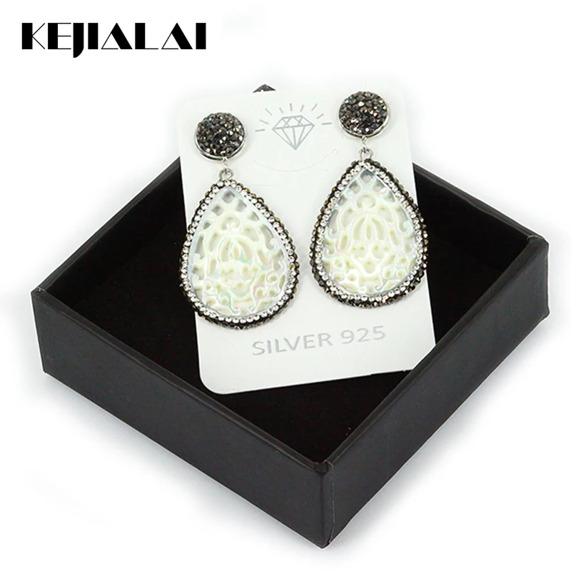 Fashion Shell Pearl Earrings Hollow Out Shell Pendant Pave Black White Rhinestone Drop Earrings For Women European Hot Sale Gift
Fashion Shell Pearl Earrings Hollow Out Shell Pendant Pave Black White Rhinestone Drop Earrings For Women European Hot Sale Gift