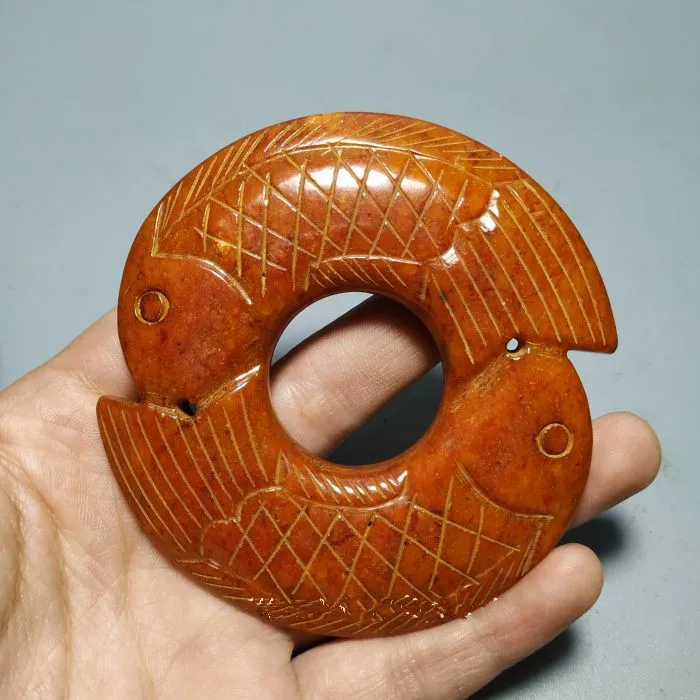 Chinese antique Ming and Qing Dynasty double fish jade.
Chinese antique Ming and Qing Dynasty double fish jade.