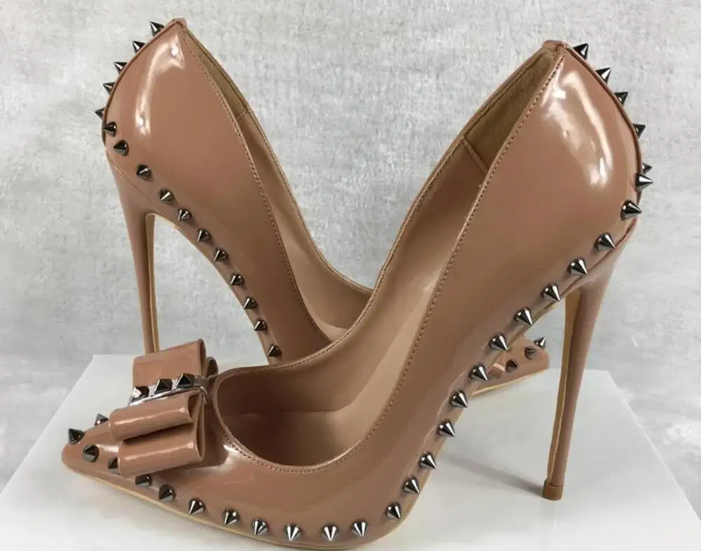 European and American style nude color patent leather bow rivet single shoes pointed high heel stiletto wedding shoes
European and American style nude color patent leather bow rivet single shoes pointed high heel stiletto wedding shoes