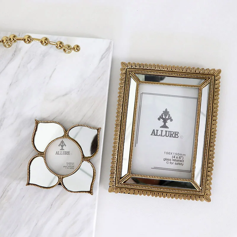 European American retro retro golden mirror photo frame French classical small luxury photo set creative decoration
European American retro retro golden mirror photo frame French classical small luxury photo set creative decoration