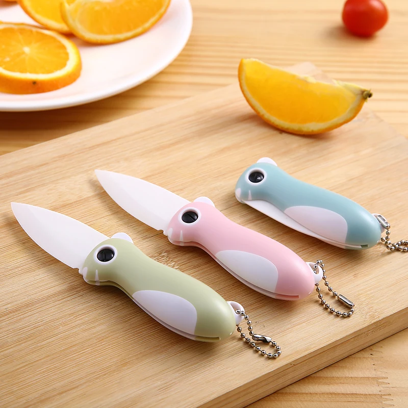 Creative cute ceramic knife folding kitchen knives with Chain fruit cutter slicer Portable Peeler cutting tool
Creative cute ceramic knife folding kitchen knives with Chain fruit cutter slicer Portable Peeler cutting tool