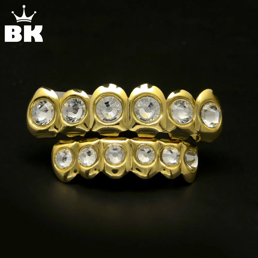 New Style Hip Hop Bling Bling Rhinestone TeethGrillz Gold Silver Color Top Bottom Grills Set Silicone Christmas Vampire Teeth
New Style Hip Hop Bling Bling Rhinestone TeethGrillz Gold Silver Color Top Bottom Grills Set Silicone Christmas Vampire Teeth