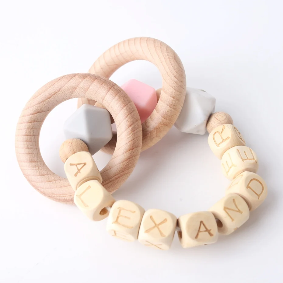 1pc Customize The Baby's Name Sensory Chewing Toys Original Wooden Teether Nursing Bracelet Baby Teether Rattle Toys
1pc Customize The Baby's Name Sensory Chewing Toys Original Wooden Teether Nursing Bracelet Baby Teether Rattle Toys