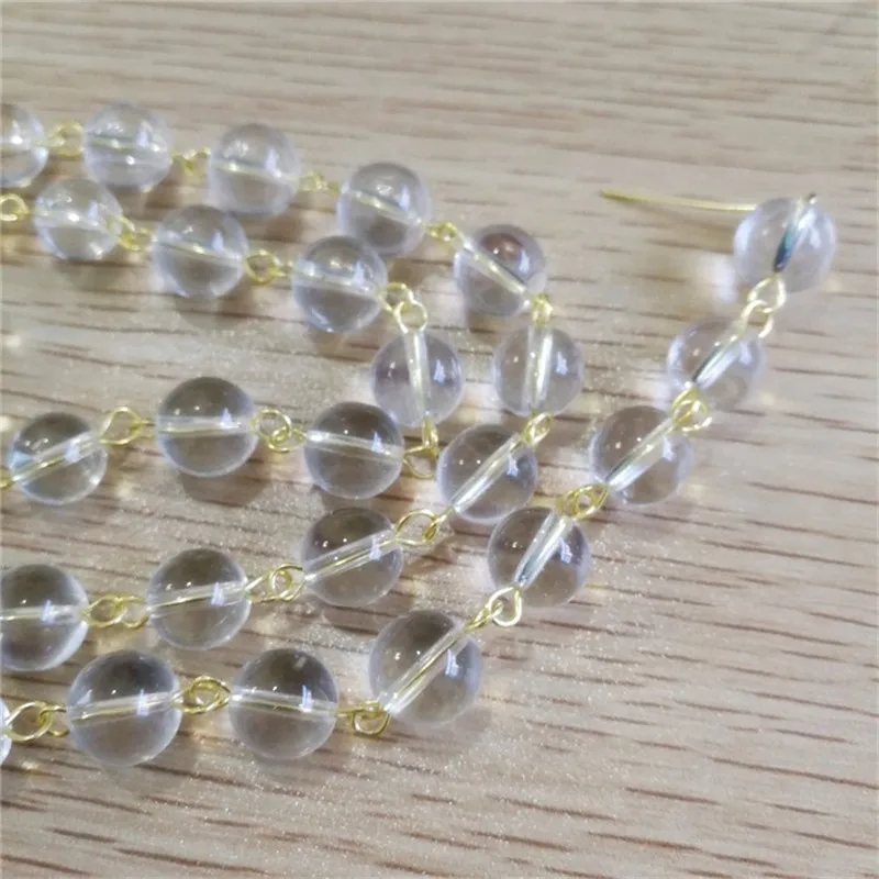 Clear Transparent Crystal Round Beads with Gold Pin Chains for Party&Event Decoration
Clear Transparent Crystal Round Beads with Gold Pin Chains for Party&Event Decoration