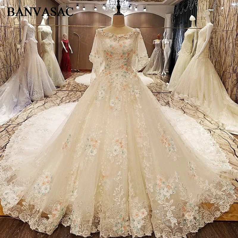 BANVASAC 2018 Plus Size Real Photos Beadings Ball Gown Wedding Dresses Long Sleeve Lace Flowers Cathedral Train Bridal Dresses
BANVASAC 2018 Plus Size Real Photos Beadings Ball Gown Wedding Dresses Long Sleeve Lace Flowers Cathedral Train Bridal Dresses
