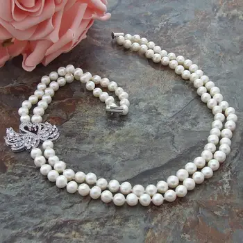 Hand knotted 2 rows 8-9mm freshwater cultured pearl micro inlay zircon accessories tassel pendant sweater necklace long 50-53 cm
Hand knotted 2 rows 8-9mm freshwater cultured pearl micro inlay zircon accessories tassel pendant sweater necklace long 50-53 cm