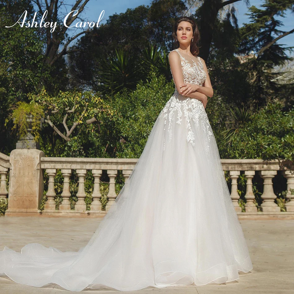 Ashley Carol Illusion Scoop Sexy Backless Tulle Wedding Dress 2019 New Beaded Appliques Bride Dresses Court Train Wedding Gowns
Ashley Carol Illusion Scoop Sexy Backless Tulle Wedding Dress 2019 New Beaded Appliques Bride Dresses Court Train Wedding Gowns
