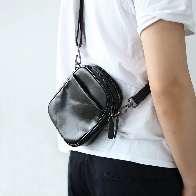 LANSPACE men's leather mobile phone bag shoulder genuine leather small bag men's messenger bag 
LANSPACE men's leather mobile phone bag shoulder genuine leather small bag men's messenger bag