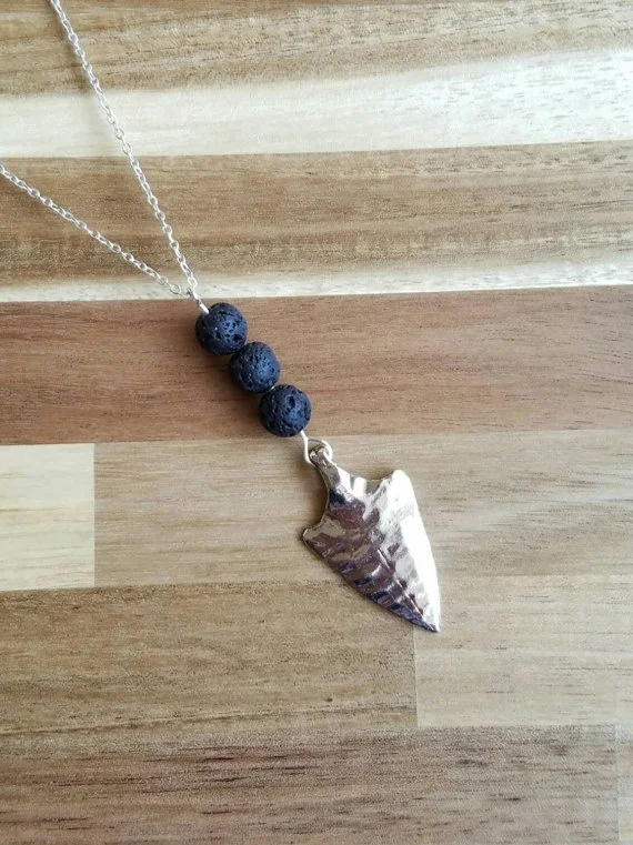 Boho Black Lava Rock Arrow Head Aromatherapy Essential Oil Diffuser Necklace Tribal Pendant Necklace
Boho Black Lava Rock Arrow Head Aromatherapy Essential Oil Diffuser Necklace Tribal Pendant Necklace