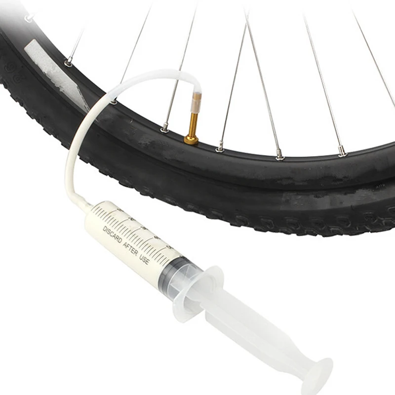 52g syringe plastic hose kit for inner tube mtb road bicycle tire tubeless valves Bike tire tubeless sealant
52g syringe plastic hose kit for inner tube mtb road bicycle tire tubeless valves Bike tire tubeless sealant