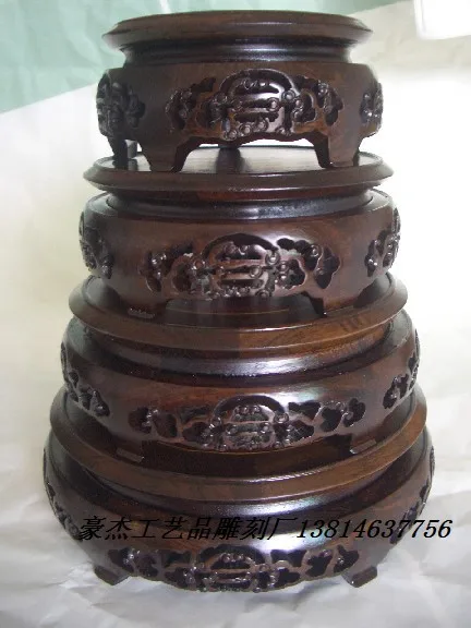 A set of four black rosewood wood longevity round flower vases African blackwood base seat
A set of four black rosewood wood longevity round flower vases African blackwood base seat