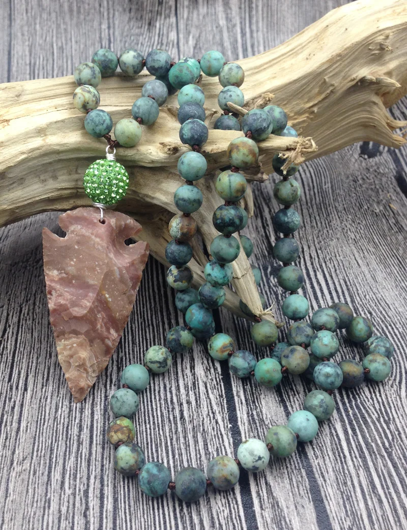 YA2663 Natural Stone Arrow Pendant Green Crystal Ball African Turquois Stone 8mm Beads Knot Handmade Necklace 30inch
YA2663 Natural Stone Arrow Pendant Green Crystal Ball African Turquois Stone 8mm Beads Knot Handmade Necklace 30inch