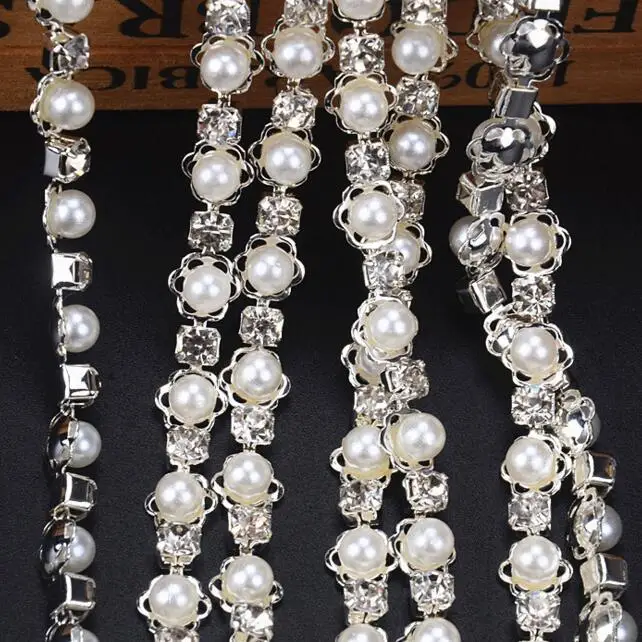 New 5yards Flower Pearl Beaded Crystal Rhinestone Applique Chain Lace Trim For Sewing Dress Belt Collar Garment Shoe Accessories
New 5yards Flower Pearl Beaded Crystal Rhinestone Applique Chain Lace Trim For Sewing Dress Belt Collar Garment Shoe Accessories