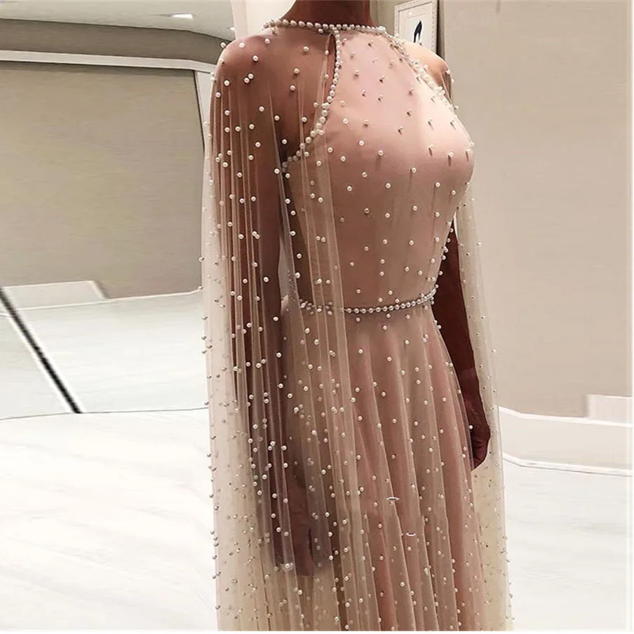 2019 Luxury Pearls A-line Evening Gowns With Cloak Sexy Backless Beaded Champagne Tutu Prom Gowns Robe De Soiree
2019 Luxury Pearls A-line Evening Gowns With Cloak Sexy Backless Beaded Champagne Tutu Prom Gowns Robe De Soiree