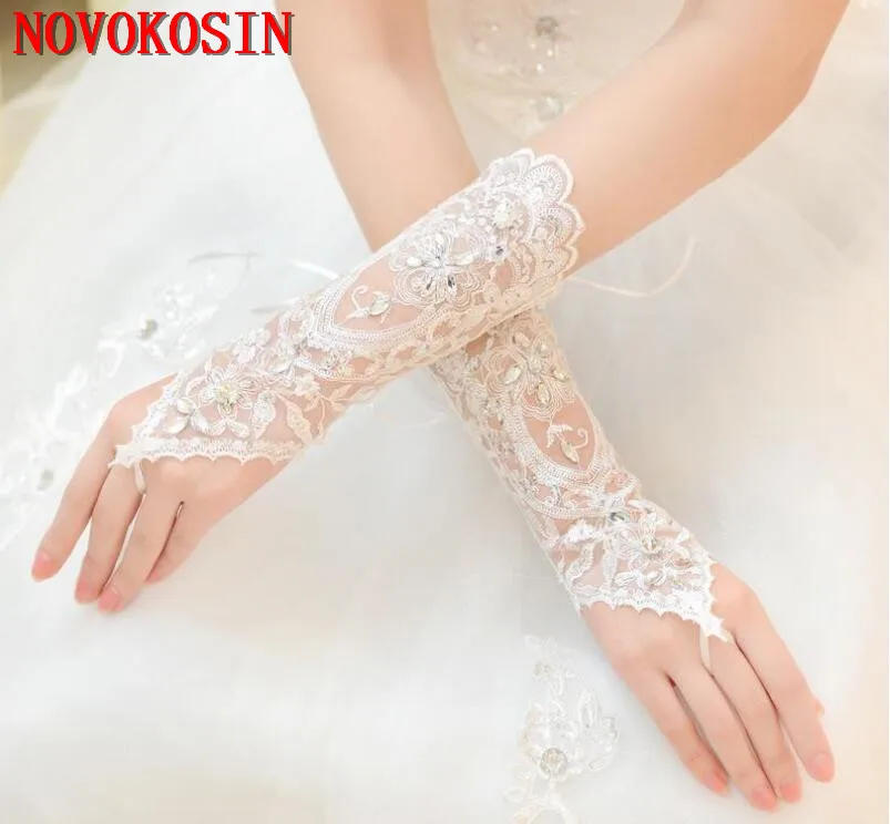 2019 Luxury Short Lace Bride Bridal Gloves Wedding Gloves Crystals Wedding Accessories Lace Gloves for Brides Fingerless Wrist
2019 Luxury Short Lace Bride Bridal Gloves Wedding Gloves Crystals Wedding Accessories Lace Gloves for Brides Fingerless Wrist