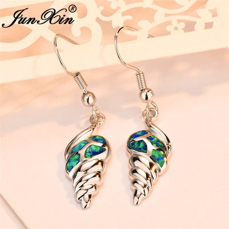 JUNXIN Cute Shell Conch Drop Earrings For Women 925 Silver Black Gold Color Blue White Fire Opal Earrings Wedding Party Jewelry
JUNXIN Cute Shell Conch Drop Earrings For Women 925 Silver Black Gold Color Blue White Fire Opal Earrings Wedding Party Jewelry