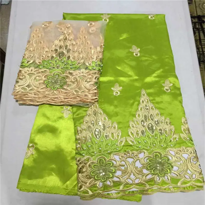 high quality Lemon green gold 5yards African george fabric + 2yards French net lace sets with many stones for making dress
high quality Lemon green gold 5yards African george fabric + 2yards French net lace sets with many stones for making dress