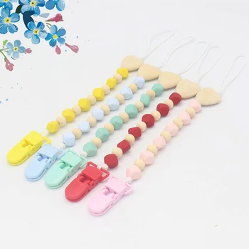 Wooden Pacifier Clip Holder Chain Teething Dummy Pacifier Baby Girl Boy Funny Teether Gift
Wooden Pacifier Clip Holder Chain Teething Dummy Pacifier Baby Girl Boy Funny Teether Gift