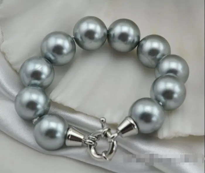 Free shipping hot sale Women Bridal Wedding Jewelry >>8"16mm round gray shell pearl bracelet
Free shipping hot sale Women Bridal Wedding Jewelry >>8"16mm round gray shell pearl bracelet