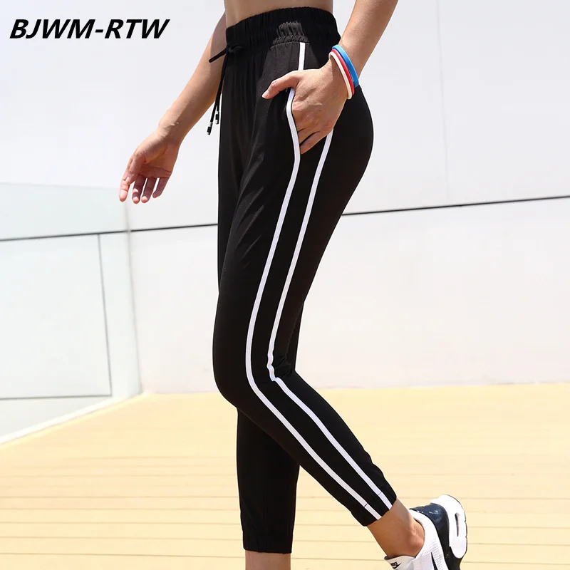 Side White Double Lines Elastic Waist Drawstring Women Yoga Pants Elastic Hem Running Sweatpants Fitness Women Gym Pants Black
Side White Double Lines Elastic Waist Drawstring Women Yoga Pants Elastic Hem Running Sweatpants Fitness Women Gym Pants Black