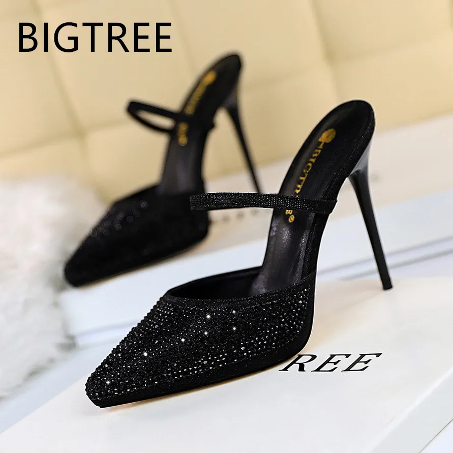 2019 Fashion new thin heel Slippers Sexy Slides high heels Ankle strap Mules shoe Glitter pointed toe Rhinestone Lady pump bling
2019 Fashion new thin heel Slippers Sexy Slides high heels Ankle strap Mules shoe Glitter pointed toe Rhinestone Lady pump bling