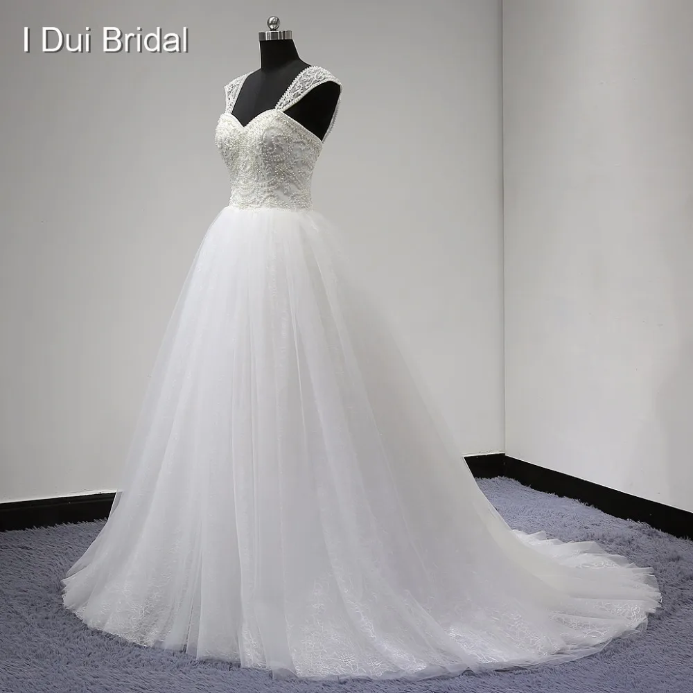 Ball Gown Wedding Dresses with Detachable Strap Luxury Pearl Beaded Tulle Lace Layer Sweetheart Factory Real Photo
Ball Gown Wedding Dresses with Detachable Strap Luxury Pearl Beaded Tulle Lace Layer Sweetheart Factory Real Photo