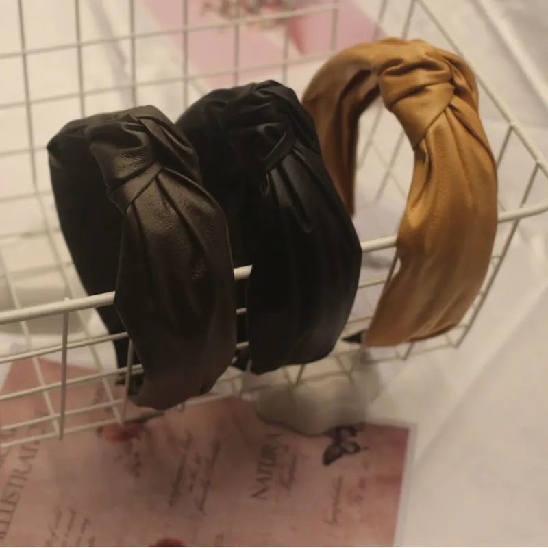 Fashion New PU Leather Middle Knotted Headbands For Women Bow Hairband Headband Hair Hoop Girls Hair Accessories
Fashion New PU Leather Middle Knotted Headbands For Women Bow Hairband Headband Hair Hoop Girls Hair Accessories