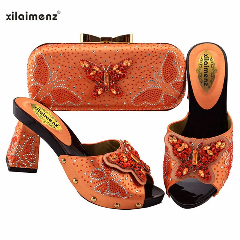 Xilaimenz 2019 New Design Mature Style African Ladies High Quality Shoes with Evening Bag to Match in Orange Color for Slipper
Xilaimenz 2019 New Design Mature Style African Ladies High Quality Shoes with Evening Bag to Match in Orange Color for Slipper