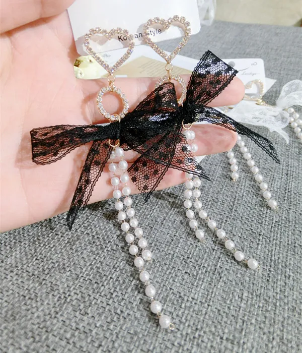New Woman Drop Earrings Cute Rhinestones Heart Big Lace Bowknot Long Tassel Pearl Dangle Earrings High Quality Fashion Jewelry
New Woman Drop Earrings Cute Rhinestones Heart Big Lace Bowknot Long Tassel Pearl Dangle Earrings High Quality Fashion Jewelry