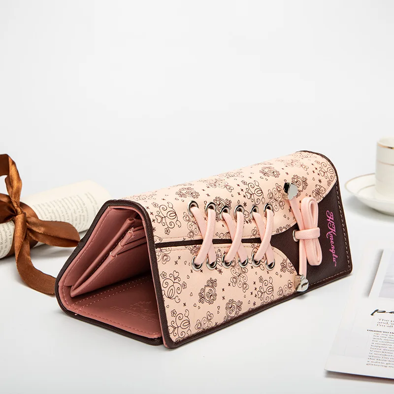 The new Korean version of women's wallets personality bow bag long wallet pu mobile phone coin purse card bag
The new Korean version of women's wallets personality bow bag long wallet pu mobile phone coin purse card bag
