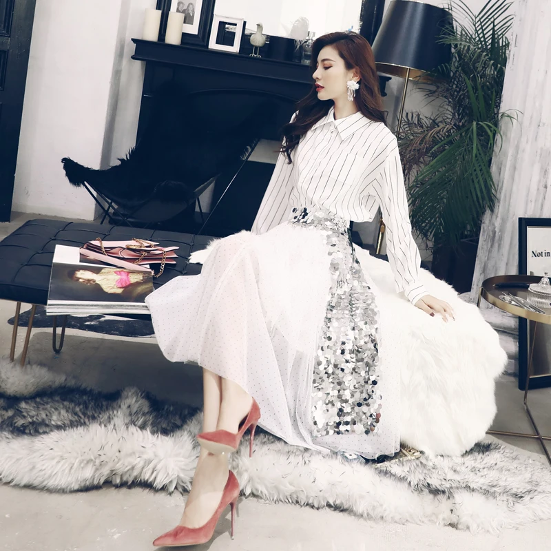 Ladies temperament Korean version of the vertical stripes long-sleeved shirt sequins mesh skirt two piece set
Ladies temperament Korean version of the vertical stripes long-sleeved shirt sequins mesh skirt two piece set