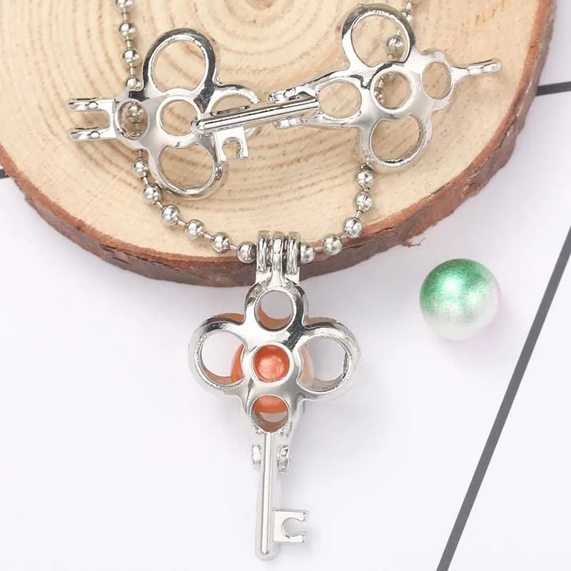 Silver Plated Key Pearl Cage Necklace Pendant Jewelry Aromatherapy Essential Oil Diffuser Oyster Pearl Aroma Box Fashion Gift
Silver Plated Key Pearl Cage Necklace Pendant Jewelry Aromatherapy Essential Oil Diffuser Oyster Pearl Aroma Box Fashion Gift