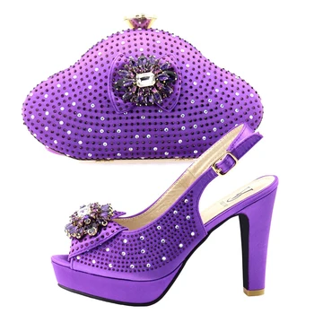 Matching shoes and bag set in purple color with many stones size38 ro 42 high heel italian shoes and bag for aso ebi SB8296-2
Matching shoes and bag set in purple color with many stones size38 ro 42 high heel italian shoes and bag for aso ebi SB8296-2