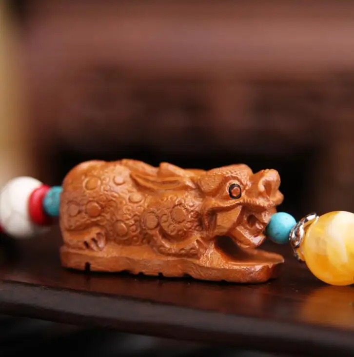 Chinese Peach Wood Carved Animal Pixiu Brave Troops Exquisite Car Key Pendant Bag Pendant
Chinese Peach Wood Carved Animal Pixiu Brave Troops Exquisite Car Key Pendant Bag Pendant